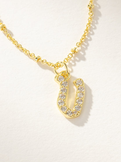 ["Made to Shine Initial Necklace ", " Gold V ", " Product Image ", " Uncommon James"]