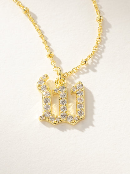 ["Made to Shine Initial Necklace ", " Gold W ", " Product Image ", " Uncommon James"]