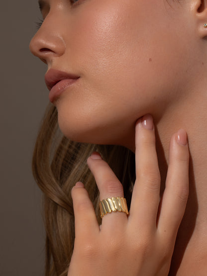 ["That Feeling Statement Ring ", " Gold ", " Model Image ", " Uncommon James"]