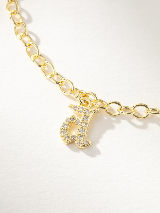 Gothic Glow Initial Bracelet | Gold | Group Image | Uncommon James