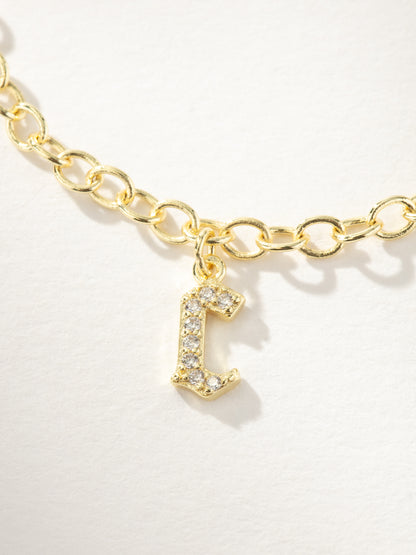 ["Gothic Glow Initial Bracelet ", " Gold C ", " Product Image ", " Uncommon James"]