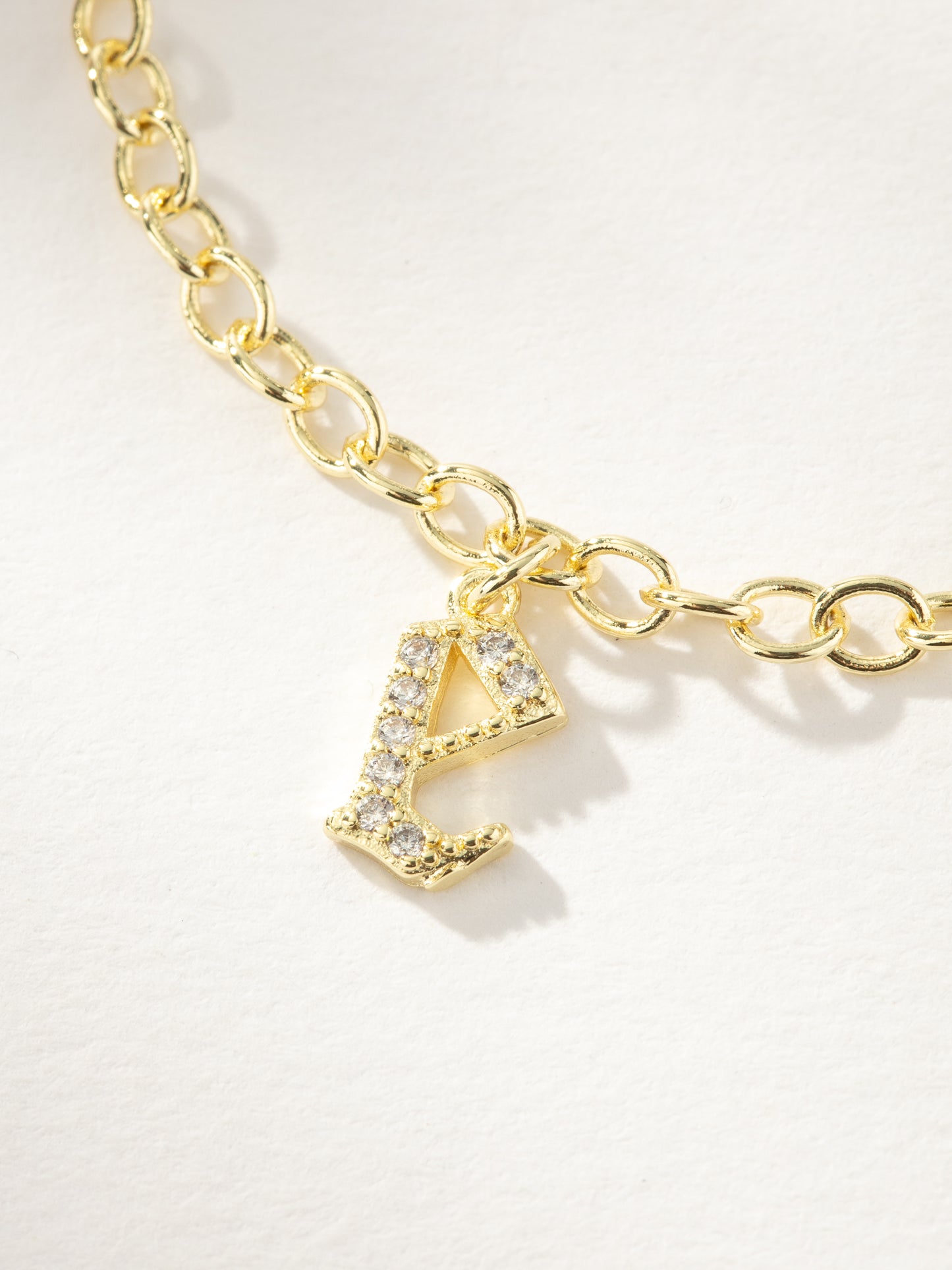 Gothic Glow Initial Bracelet | Gold E | Product Image | Uncommon James