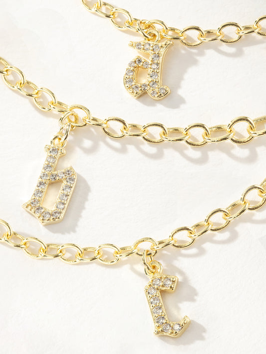 Gothic Glow Initial Bracelet | Gold | Group Image | Uncommon James