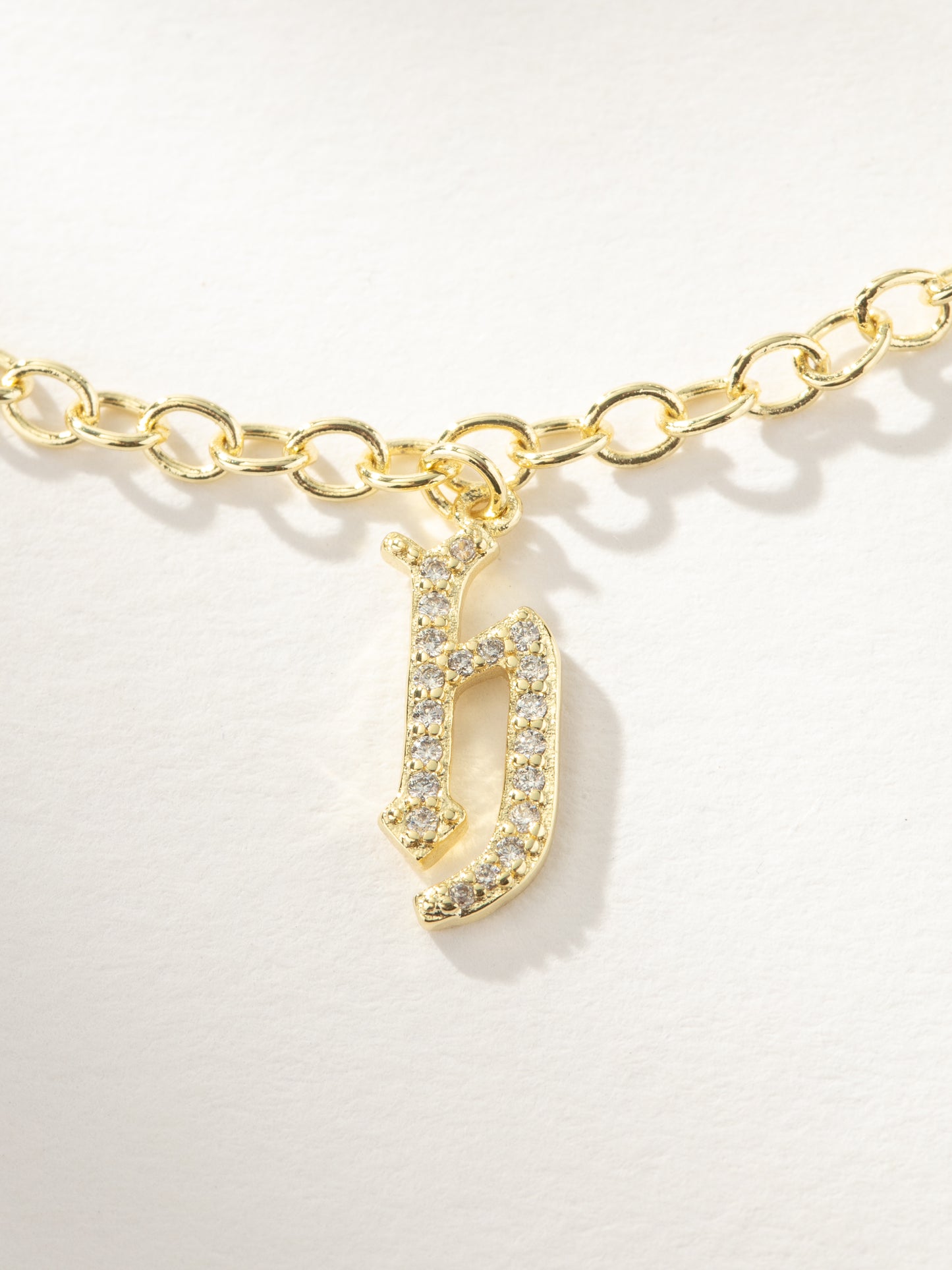 Gothic Glow Initial Bracelet | Gold H | Product Image | Uncommon James