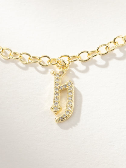 ["Gothic Glow Initial Bracelet ", " Gold H ", " Product Image ", " Uncommon James"]