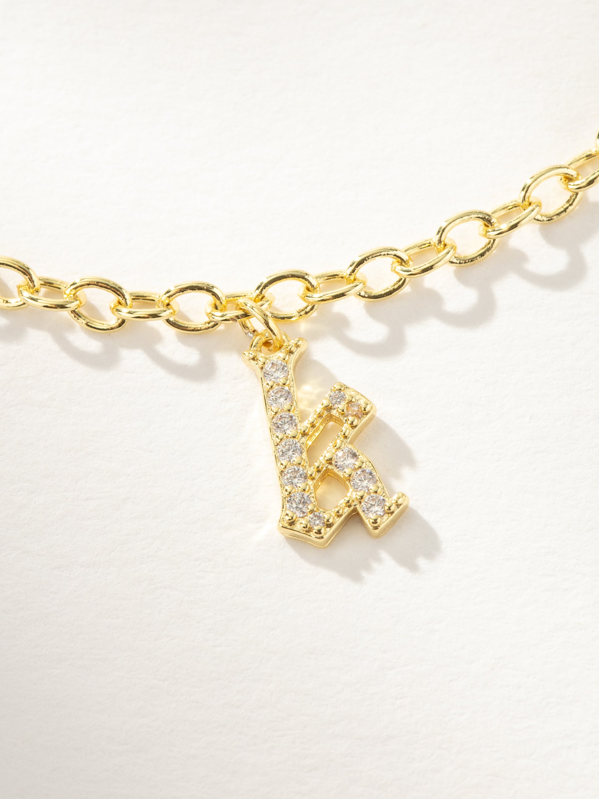 Gothic Glow Initial Bracelet | Gold K | Product Image | Uncommon James