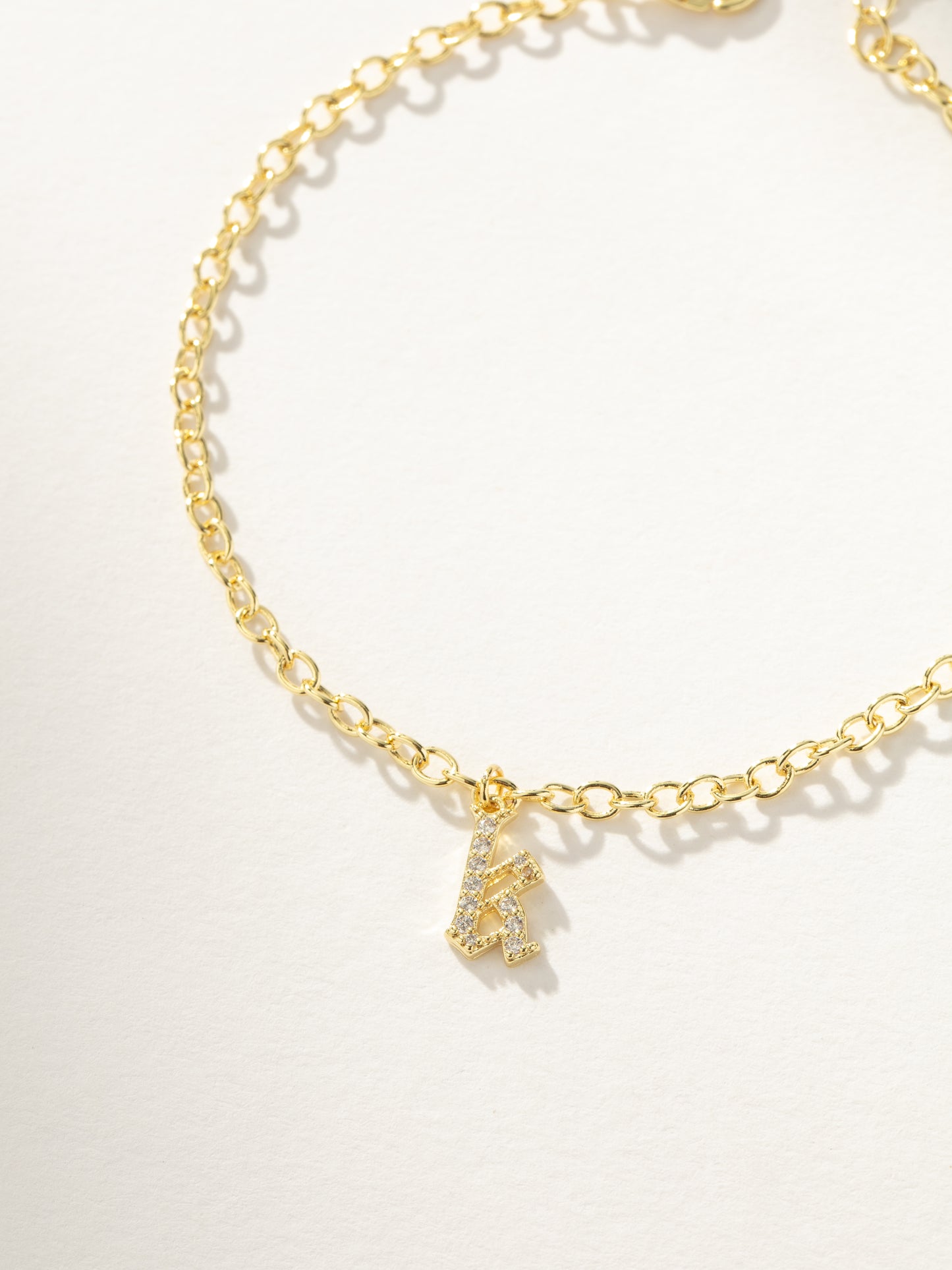 Gothic Glow Initial Bracelet | Gold | Product Image | Uncommon James