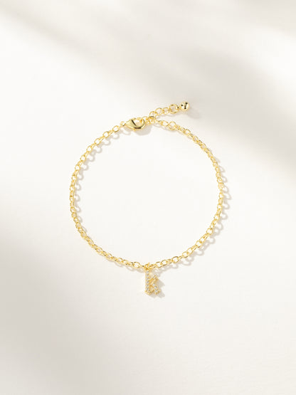 ["Gothic Glow Initial Bracelet ", " Gold ", " Product Image ", " Uncommon James"]