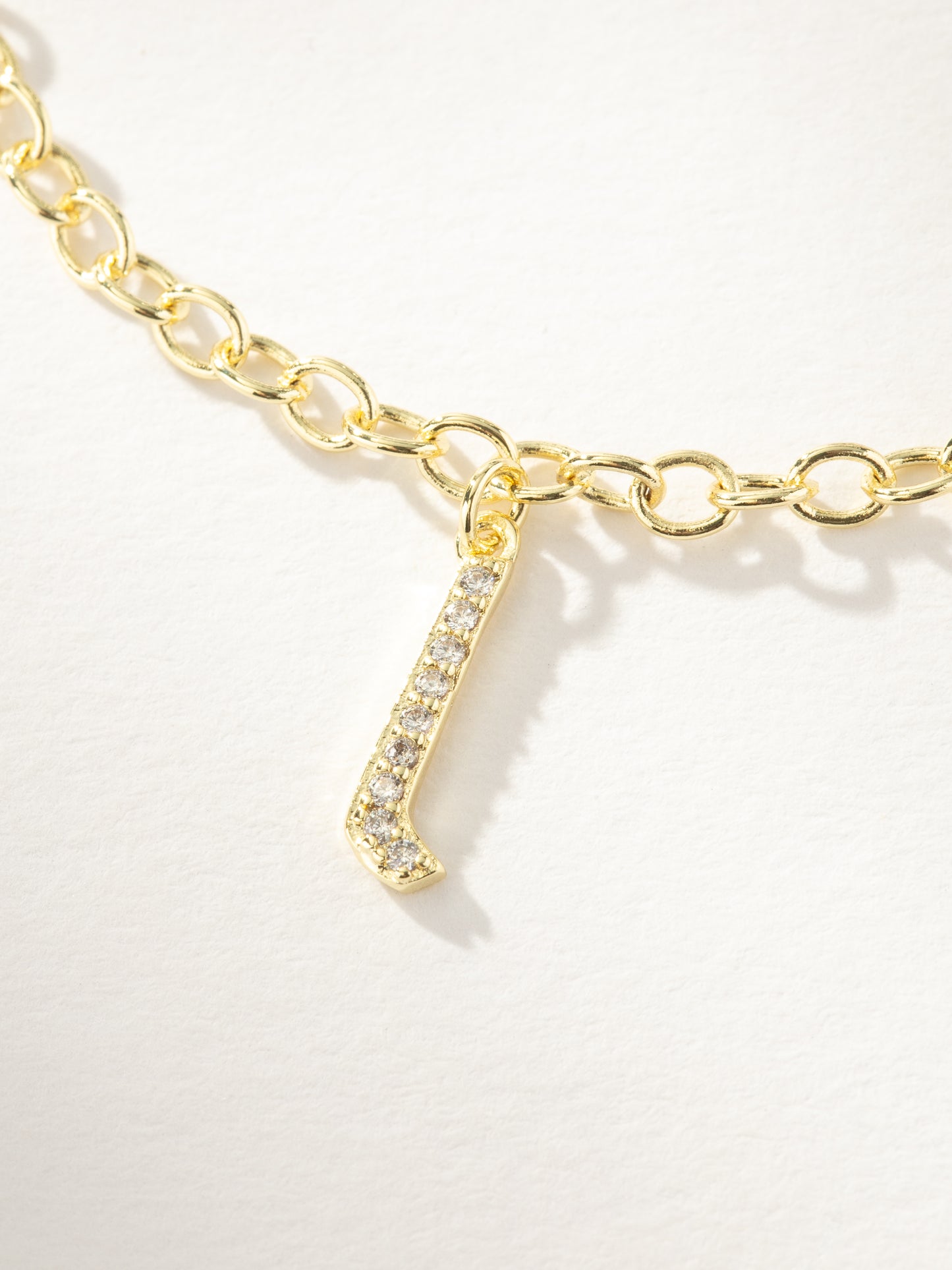 Gothic Glow Initial Bracelet | Gold L | Product Image | Uncommon James
