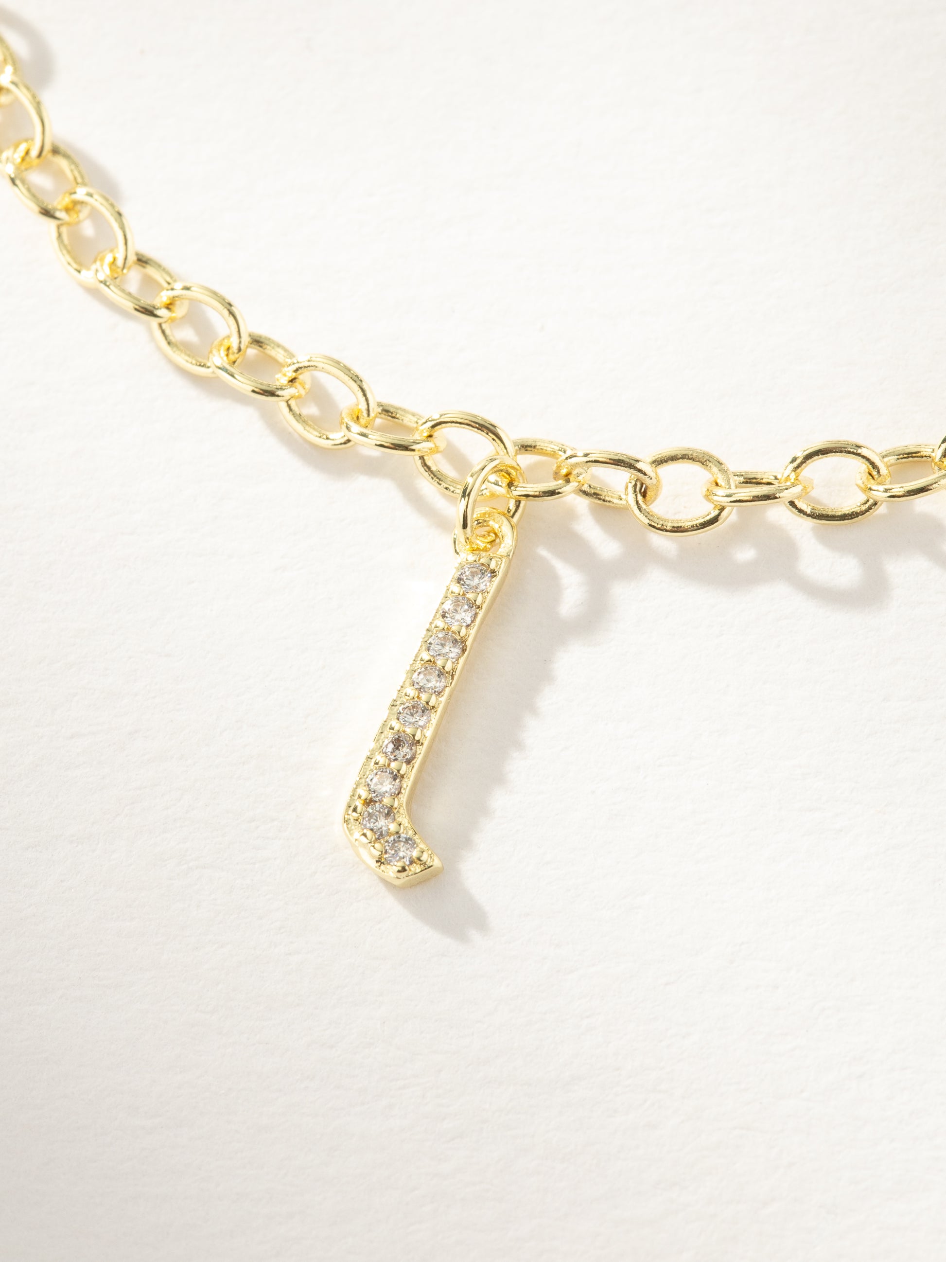 Gothic Glow Initial Bracelet | Gold L | Product Image | Uncommon James