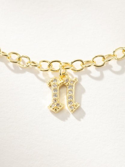 ["Gothic Glow Initial Bracelet ", " Gold N ", " Product Image ", " Uncommon James"]