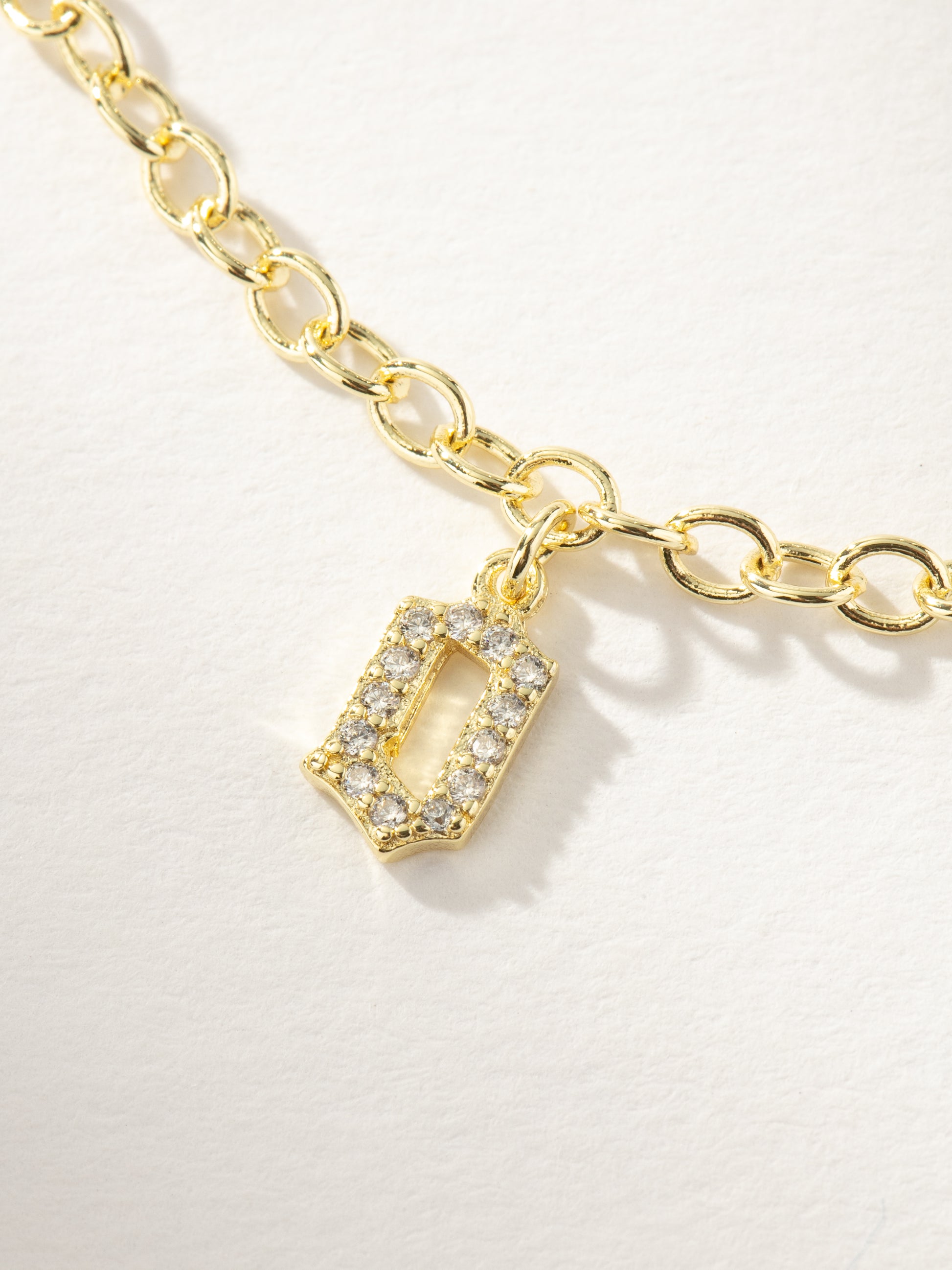 Gothic Glow Initial Bracelet | Gold O | Product Image | Uncommon James