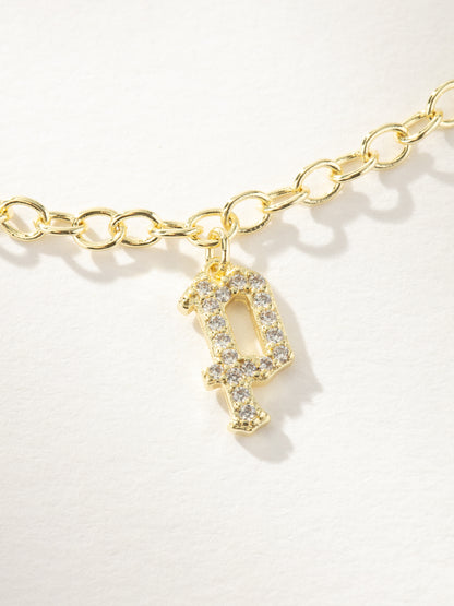 ["Gothic Glow Initial Bracelet ", " Gold P ", " Product Image ", " Uncommon James"]