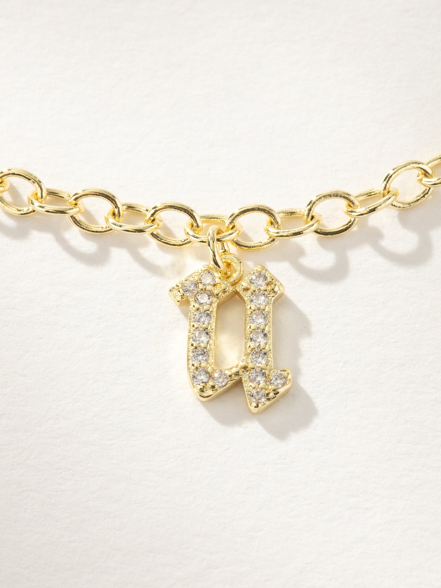Gothic Glow Initial Bracelet | Gold U | Product Image | Uncommon James