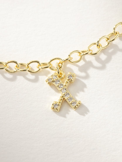 ["Gothic Glow Initial Bracelet ", " Gold X ", " Product Image ", " Uncommon James"]