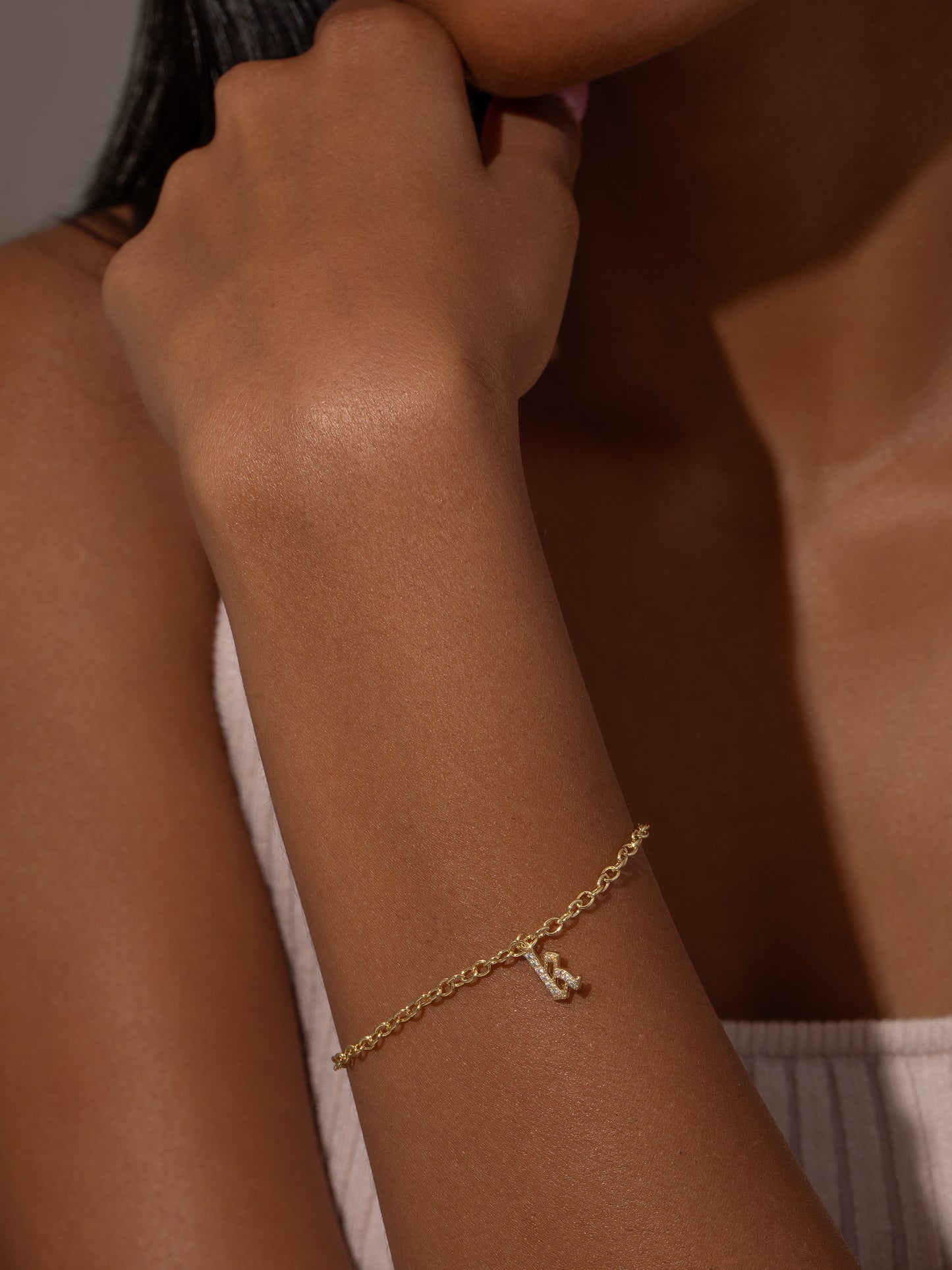 Gothic Glow Initial Bracelet | Gold | Model Image | Uncommon James