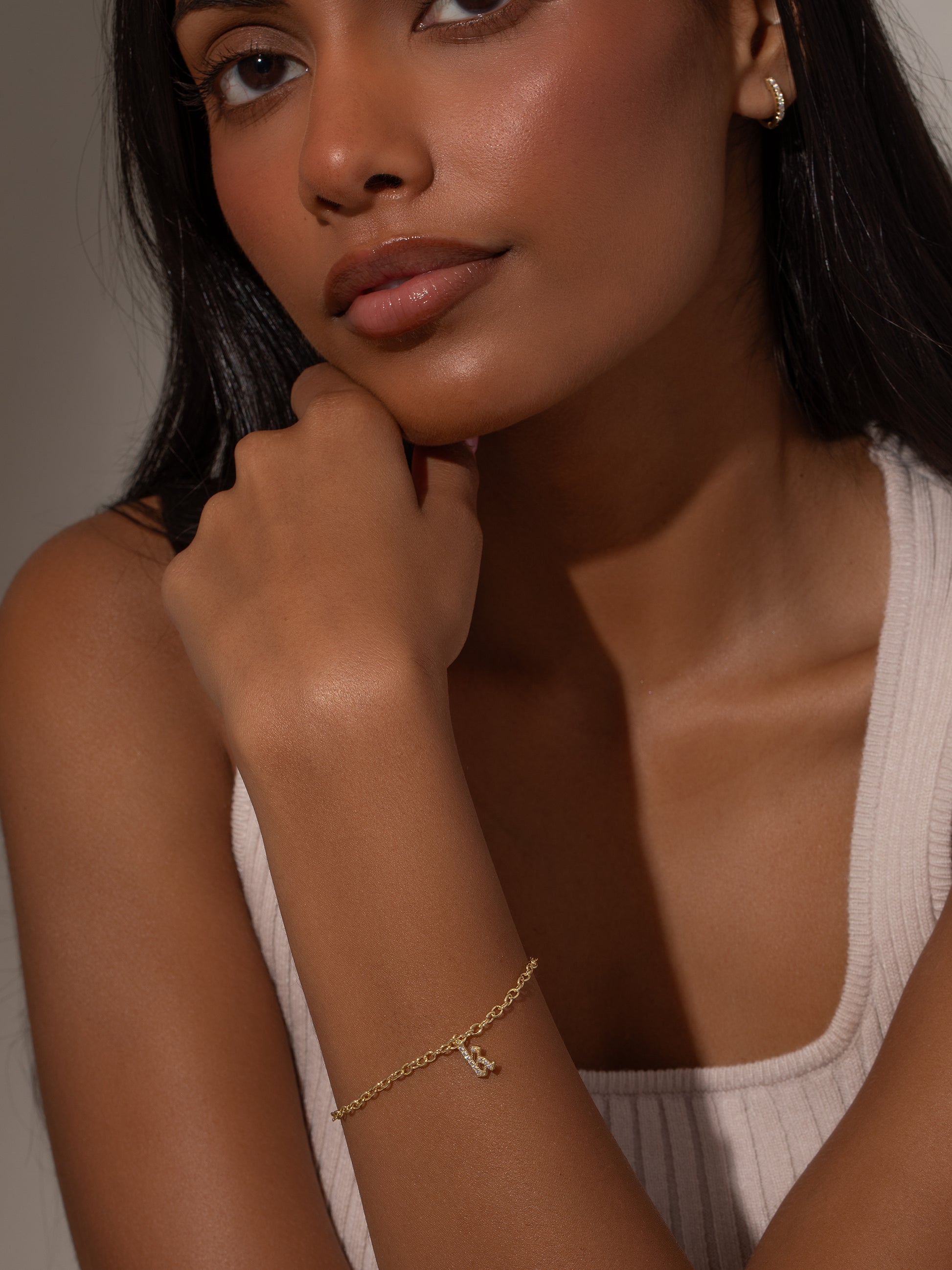 Gothic Glow Initial Bracelet | Gold | Model Image | Uncommon James