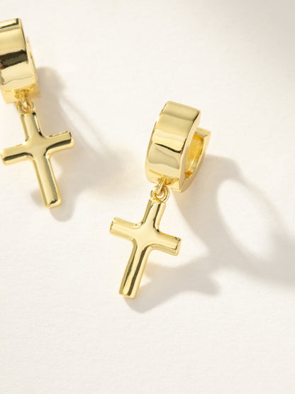 ["Bold Cross Huggie Earrings ", " Gold ", " Product Image ", " Uncommon James"]