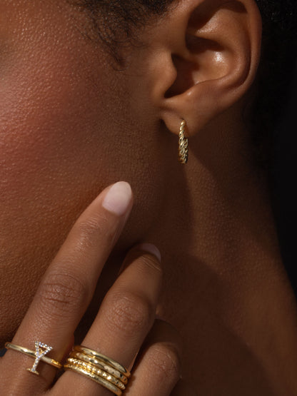 ["Croissant Hoop Earrings ", " Gold ", " Campaign Image ", " Uncommon James"]