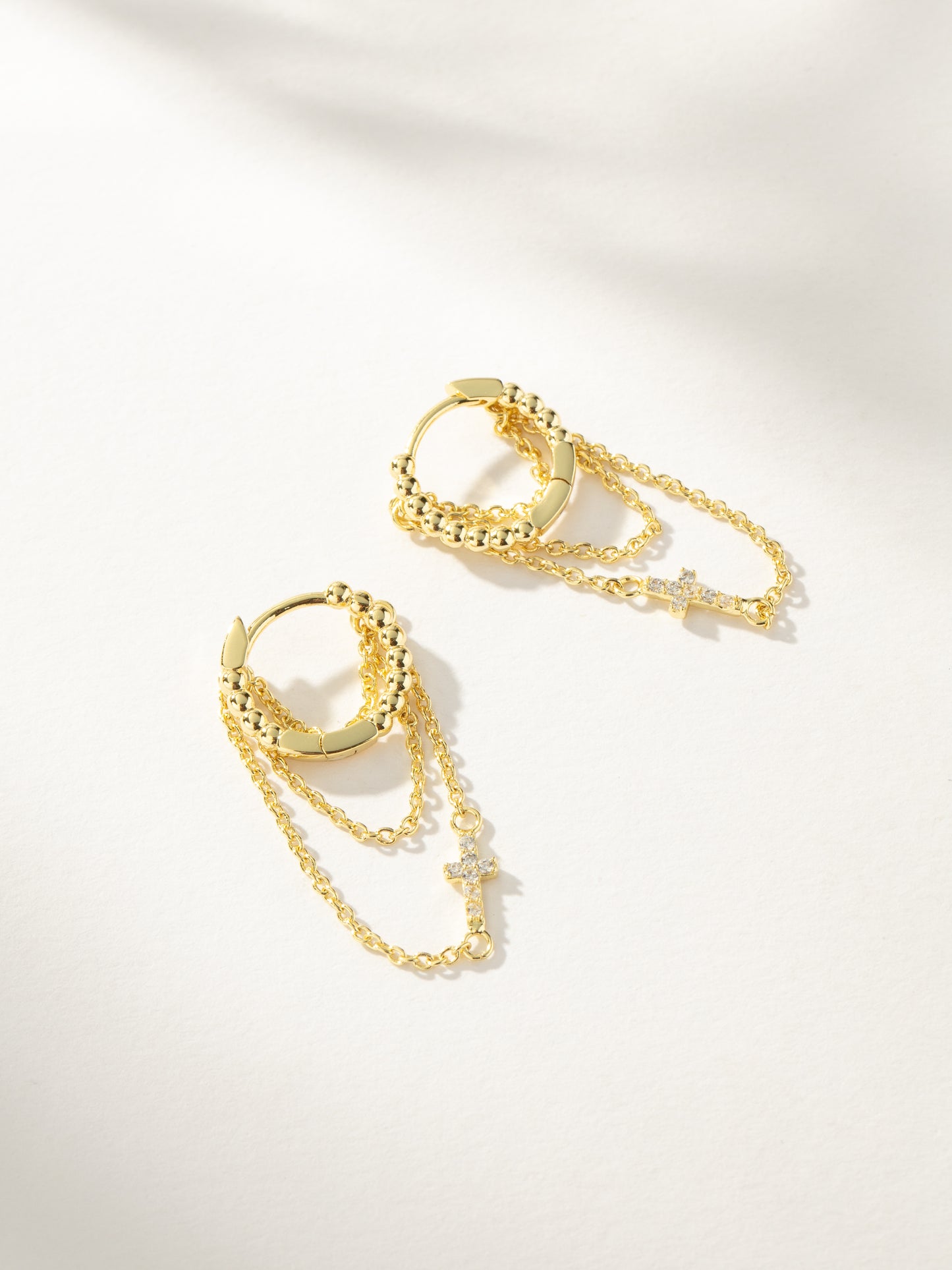 Cross and Chain Huggie Earrings | Gold | Product Image | Uncommon James