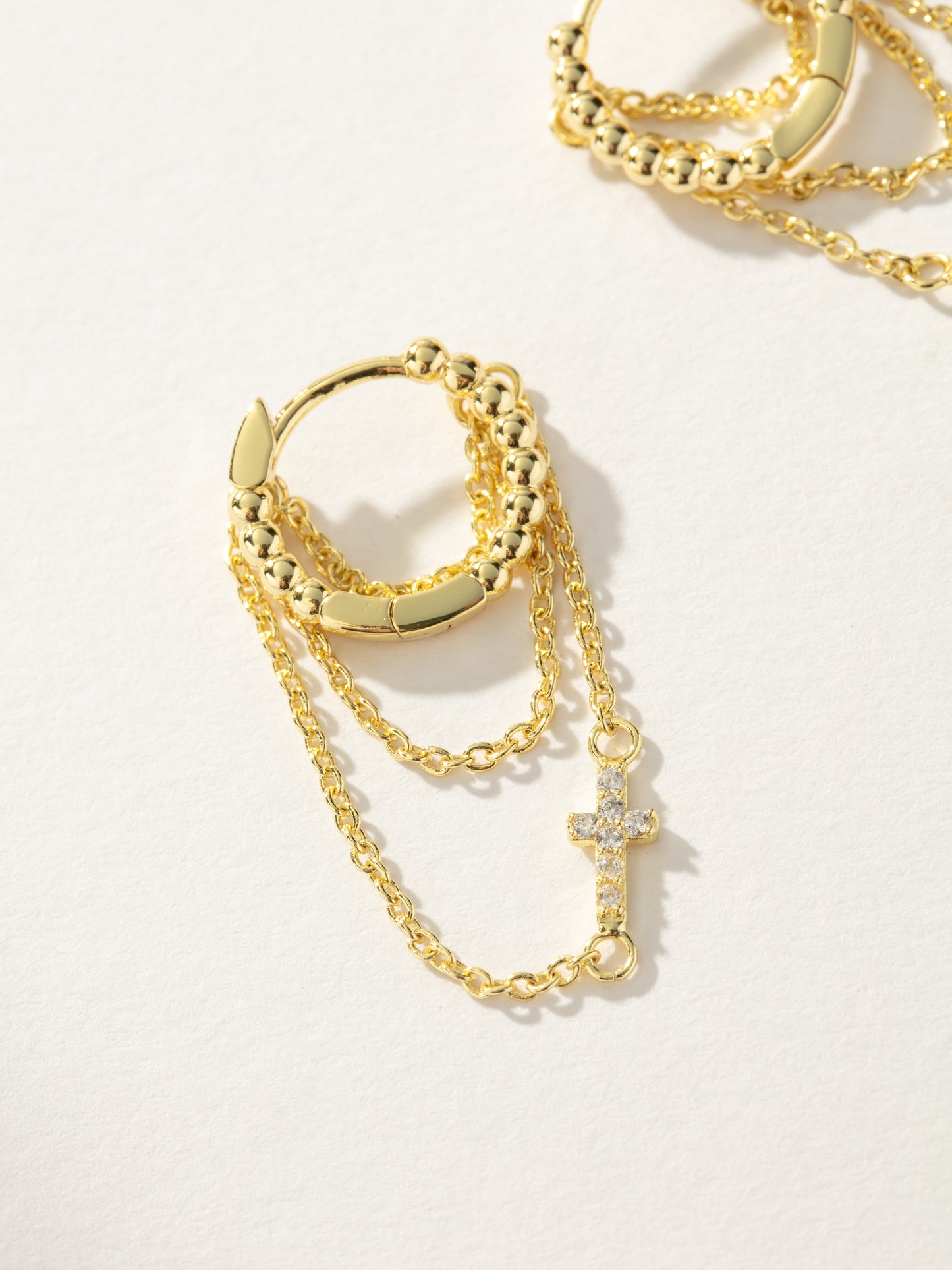 Cross and Chain Huggie Earrings | Gold | Product Image | Uncommon James