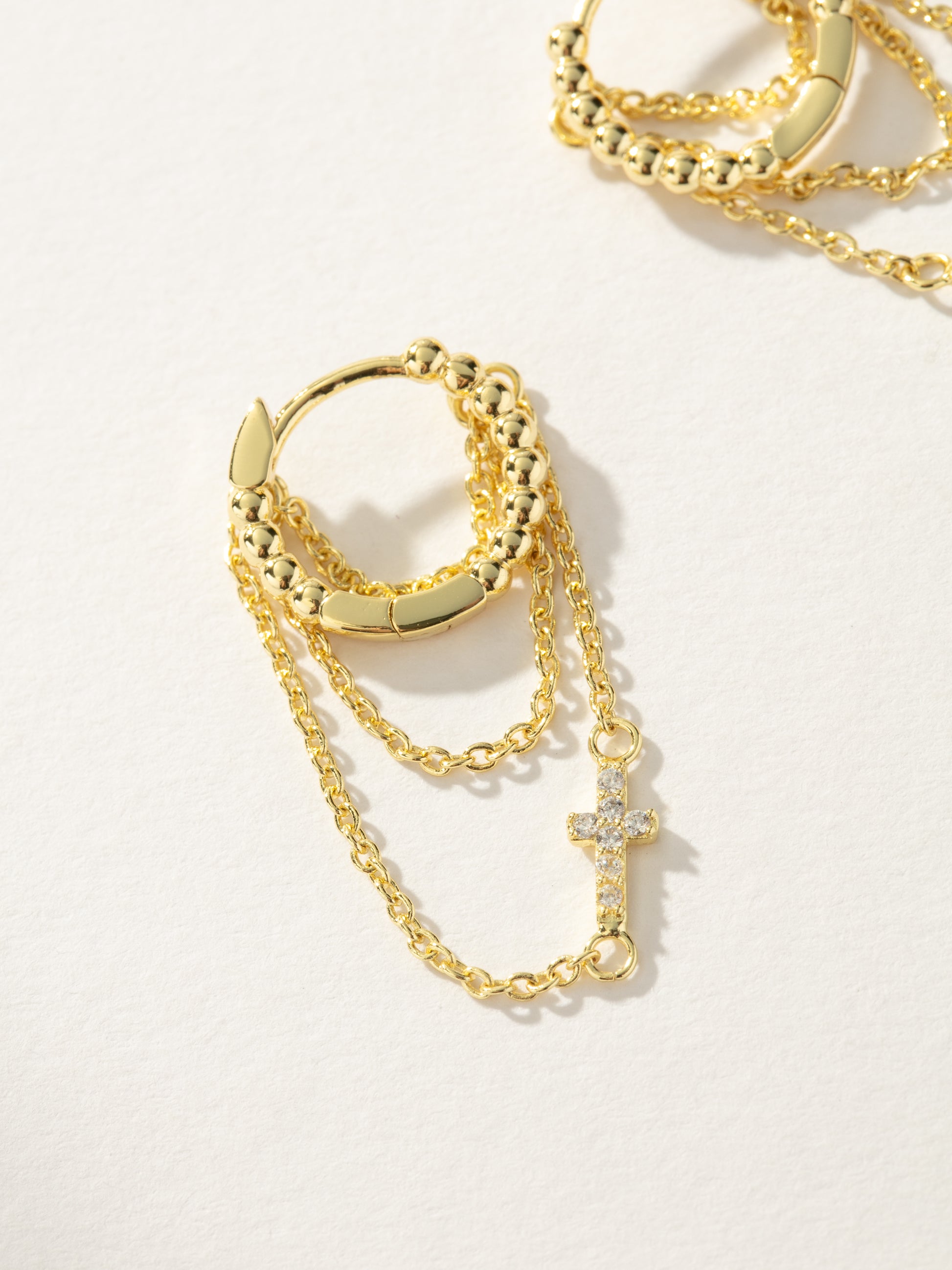 Cross and Chain Huggie Earrings | Gold | Product Image | Uncommon James