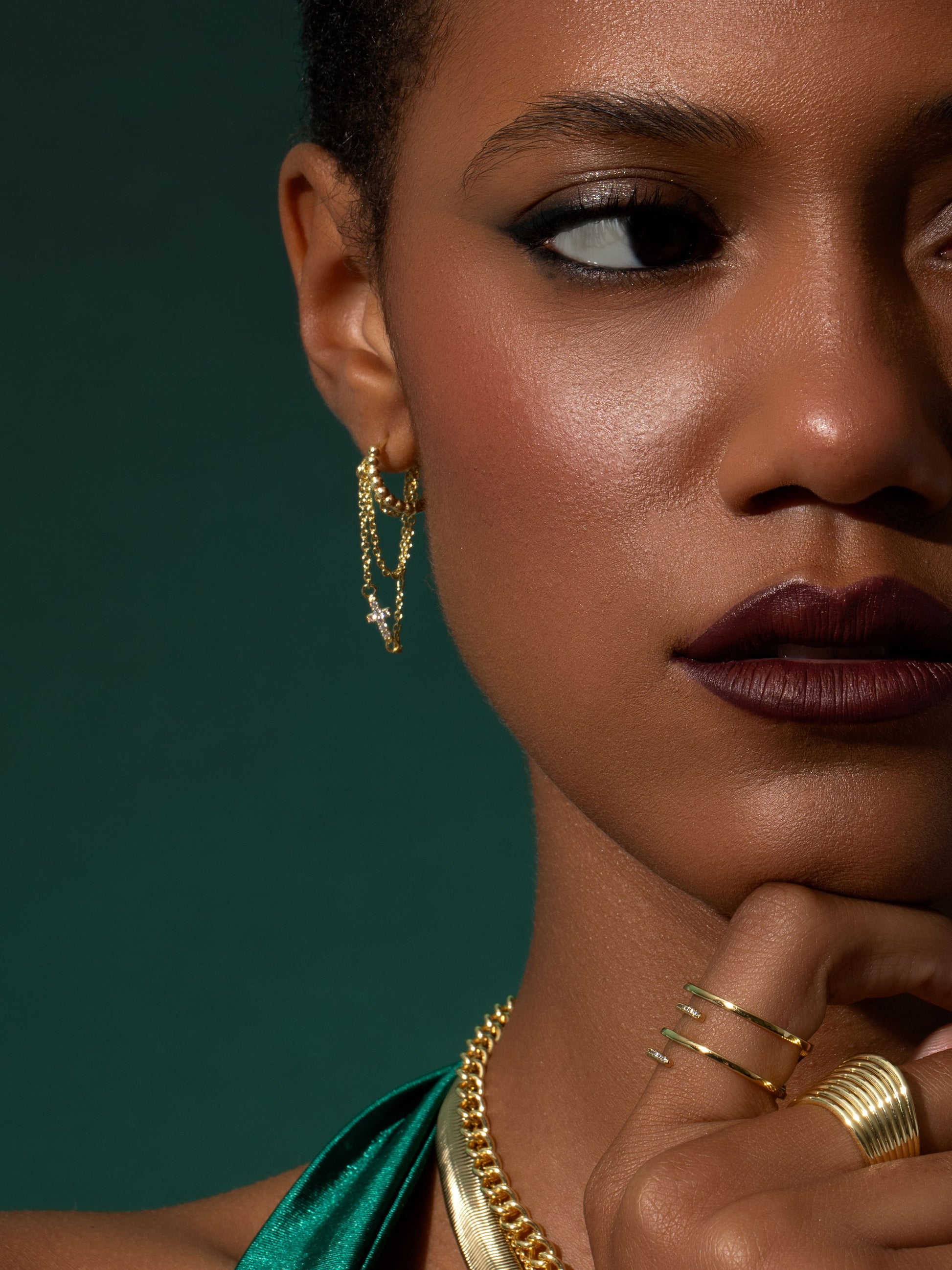 Cross and Chain Huggie Earrings | Gold | Campaign Image | Uncommon James