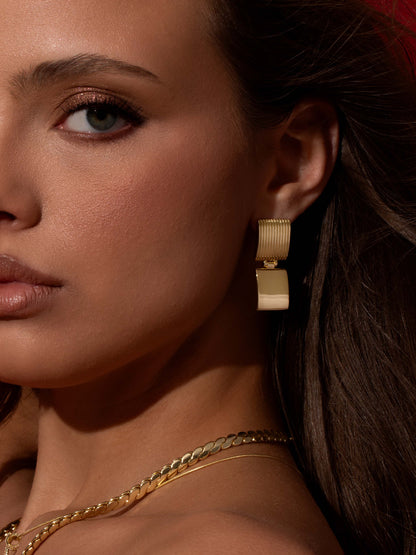 ["Hudson Square Statement Earrings ", " Gold ", " Campaign Image ", " Uncommon James"]