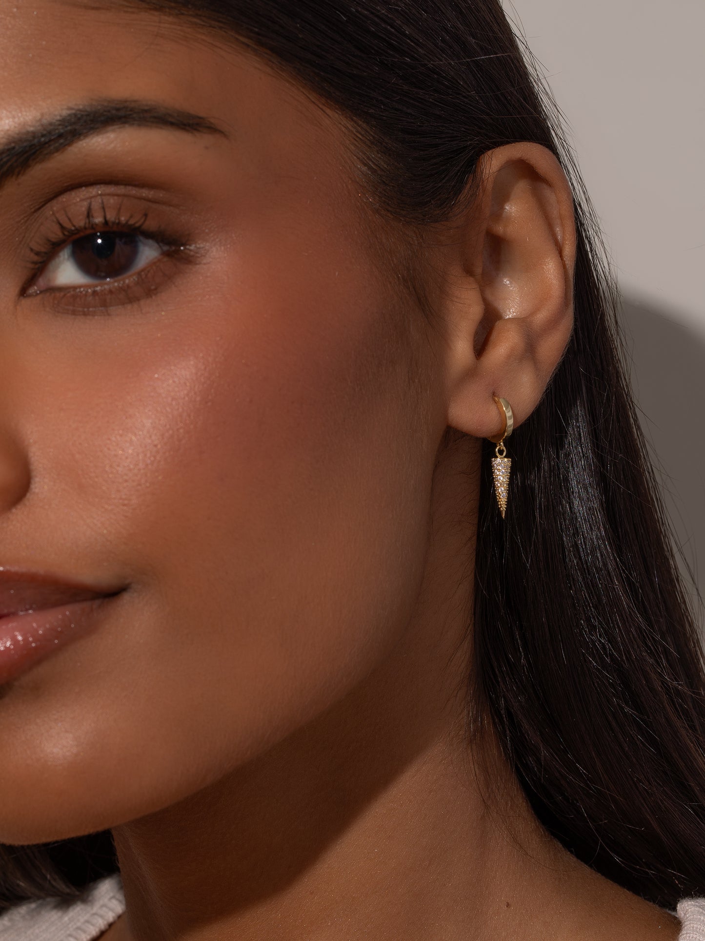 Killing It Spike Huggie Earrings | Gold | Model Image | Uncommon James