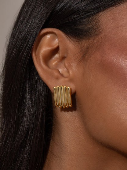 Tough Ribbed Statement Earrings | Gold | Model Image | Uncommon James
