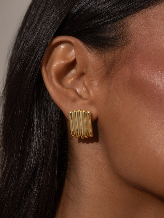 Tough Ribbed Statement Earrings | Gold | Model Image | Uncommon James