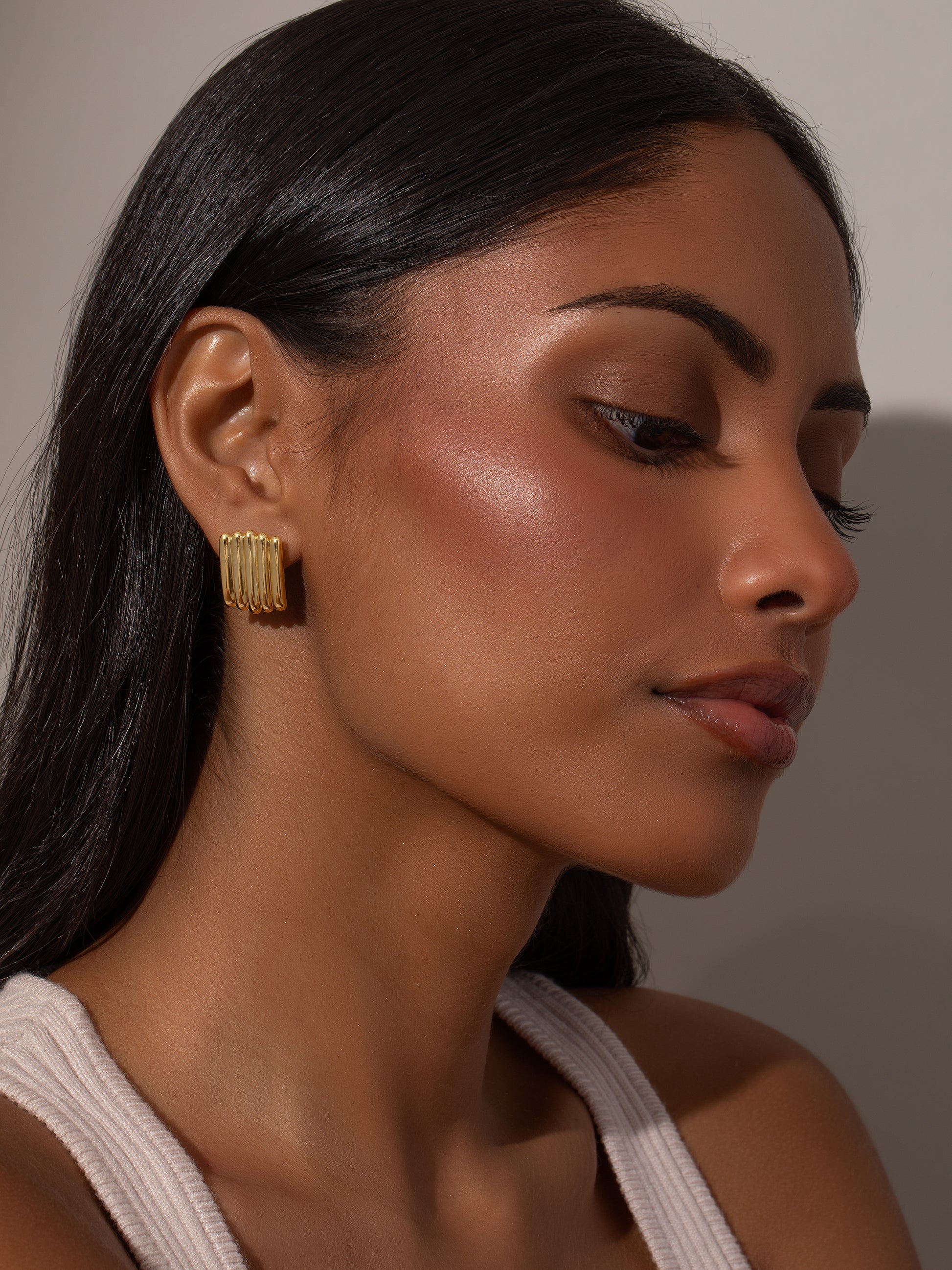 Tough Ribbed Statement Earrings | Gold | Model Image 2 | Uncommon James