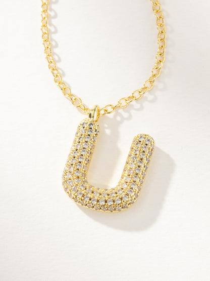 ["Bubble Letter Necklace 2.0 ", " Gold U ", " Product Image ", " Uncommon James"]