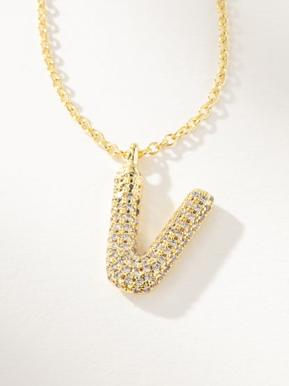 ["Bubble Letter Necklace 2.0 ", " Gold V ", " Product Image ", " Uncommon James"]