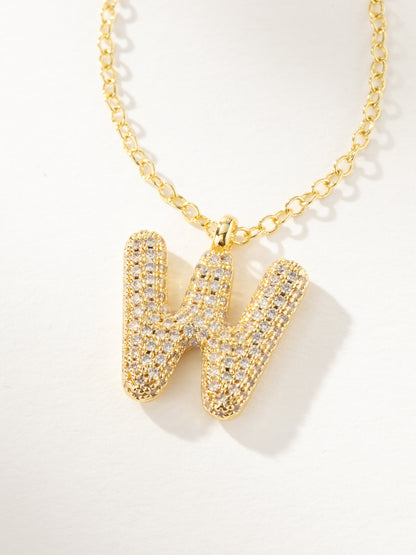 ["Bubble Letter Necklace 2.0 ", " Gold W ", " Product Image ", " Uncommon James"]