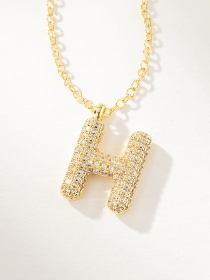 ["Bubble Letter Necklace 2.0 ", " Gold H ", " Product Image ", " Uncommon James"]