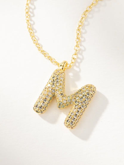 ["Bubble Letter Necklace 2.0 ", " Gold M ", " Product Image ", " Uncommon James"]