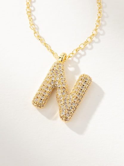 ["Bubble Letter Necklace 2.0 ", " Gold N ", " Product Image ", " Uncommon James"]
