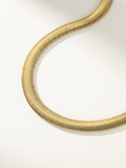 ["Emboldened Snake Chain Necklace ", " Gold ", " Product Image ", " Uncommon James"]