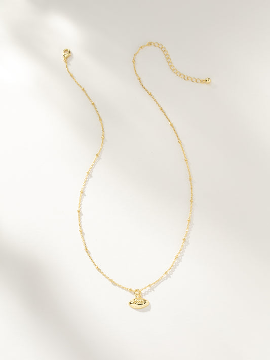 Football Pendant Necklace | Gold | Product Image | Uncommon Lifestyle