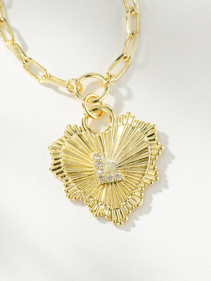 ["Lover Initial Necklace ", " Gold L ", " Product Image ", " Uncommon James"]