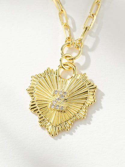 ["Lover Initial Necklace ", " Gold Z ", " Product Image ", " Uncommon James"]