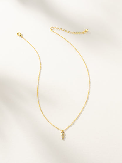 ["Moving On Arrow Necklace ", " Gold ", " Product Image ", " Uncommon James"]