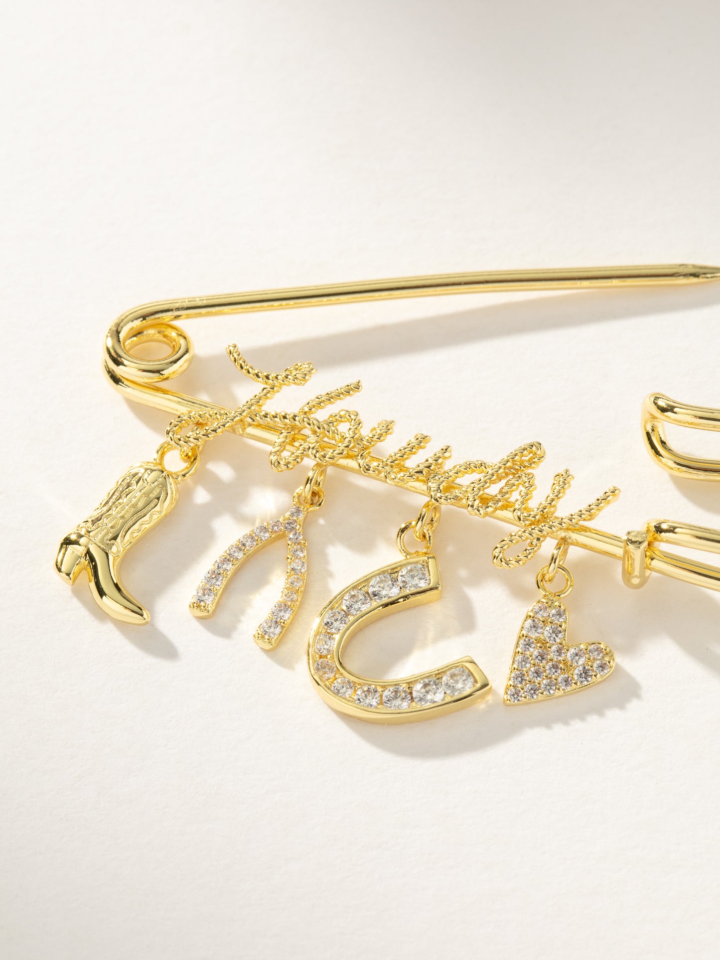 UJ x Rustler Howdy Pin | Gold | Product Image | Uncommon James