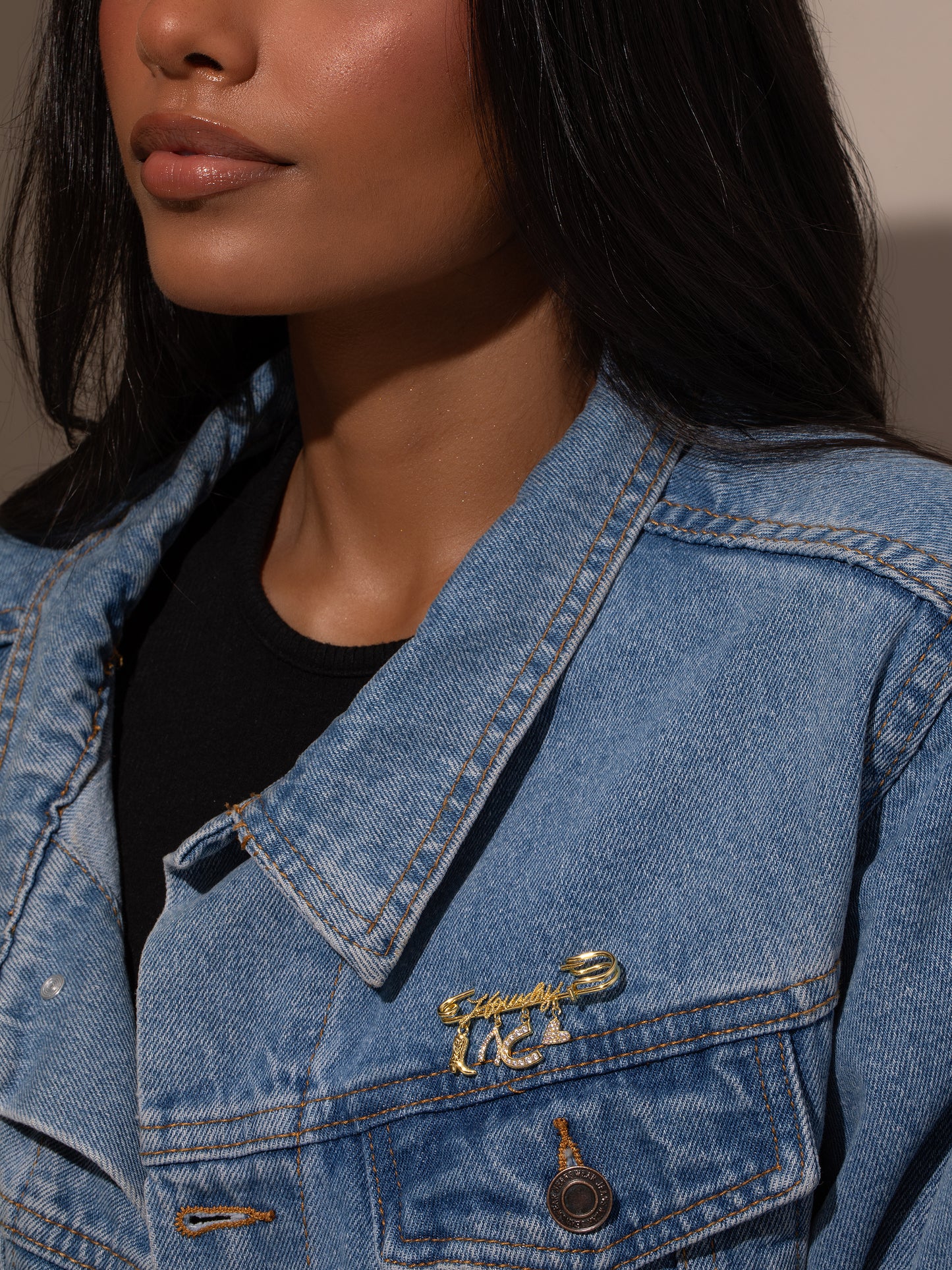 UJ x Rustler Howdy Pin | Gold | Model Image | Uncommon James
