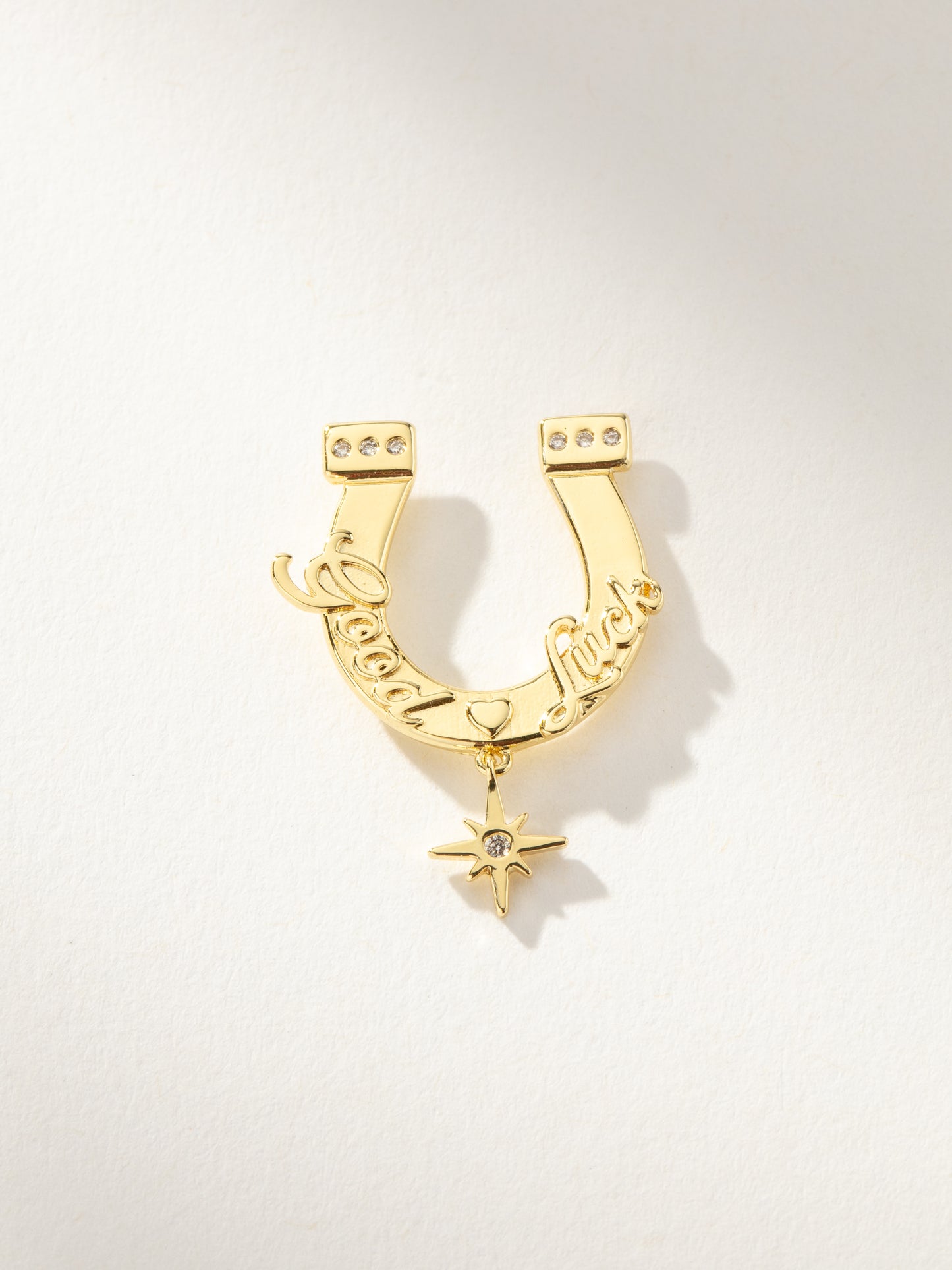 UJ x Rustler Horseshoe Push Pin | Gold | Product Image | Uncommon James