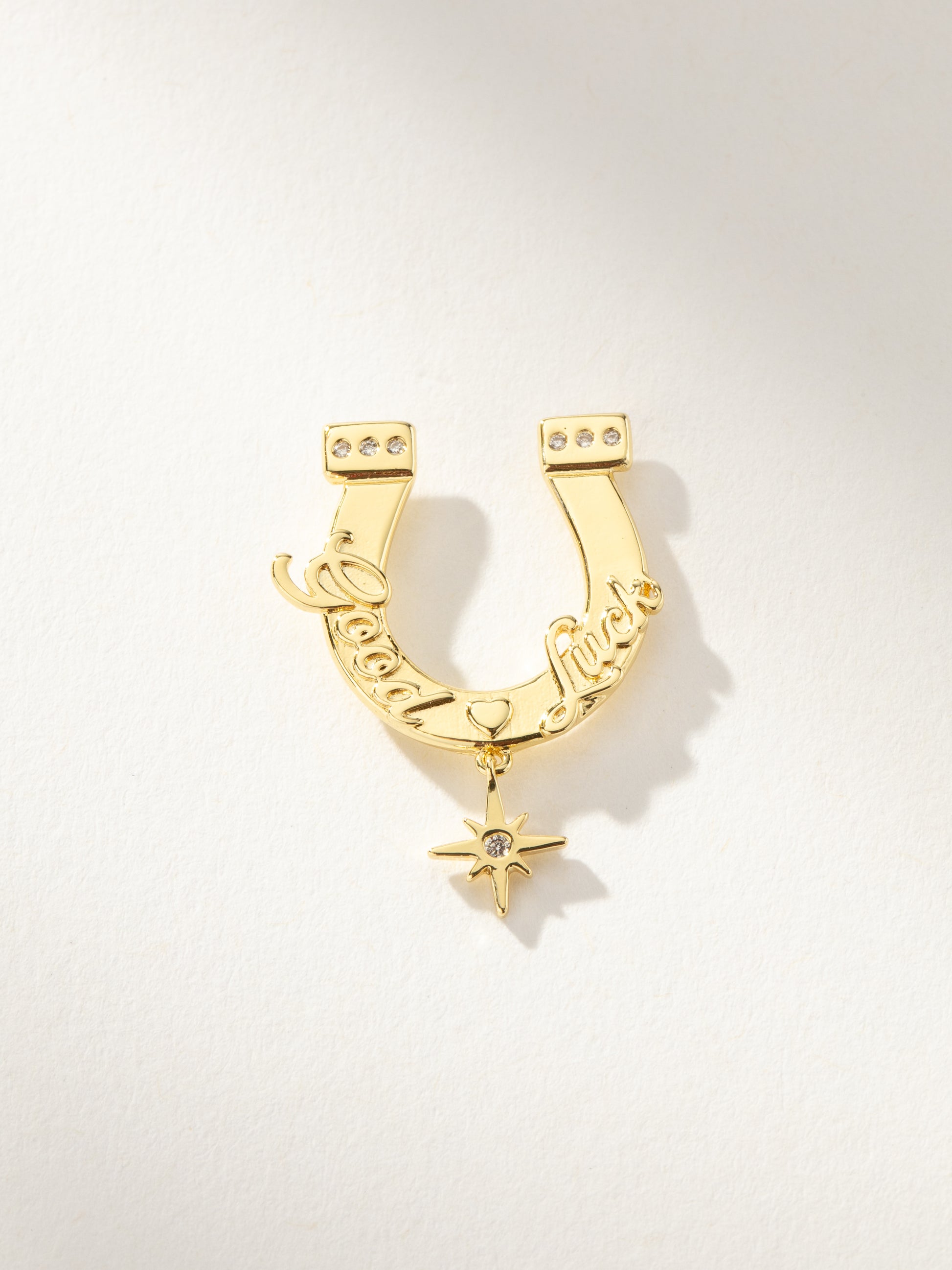 UJ x Rustler Horseshoe Push Pin | Gold | Product Image | Uncommon James