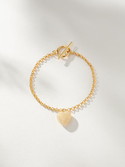 ["Change of Heart Bracelet ", " Gold ", " Product Image ", " Uncommon James"]