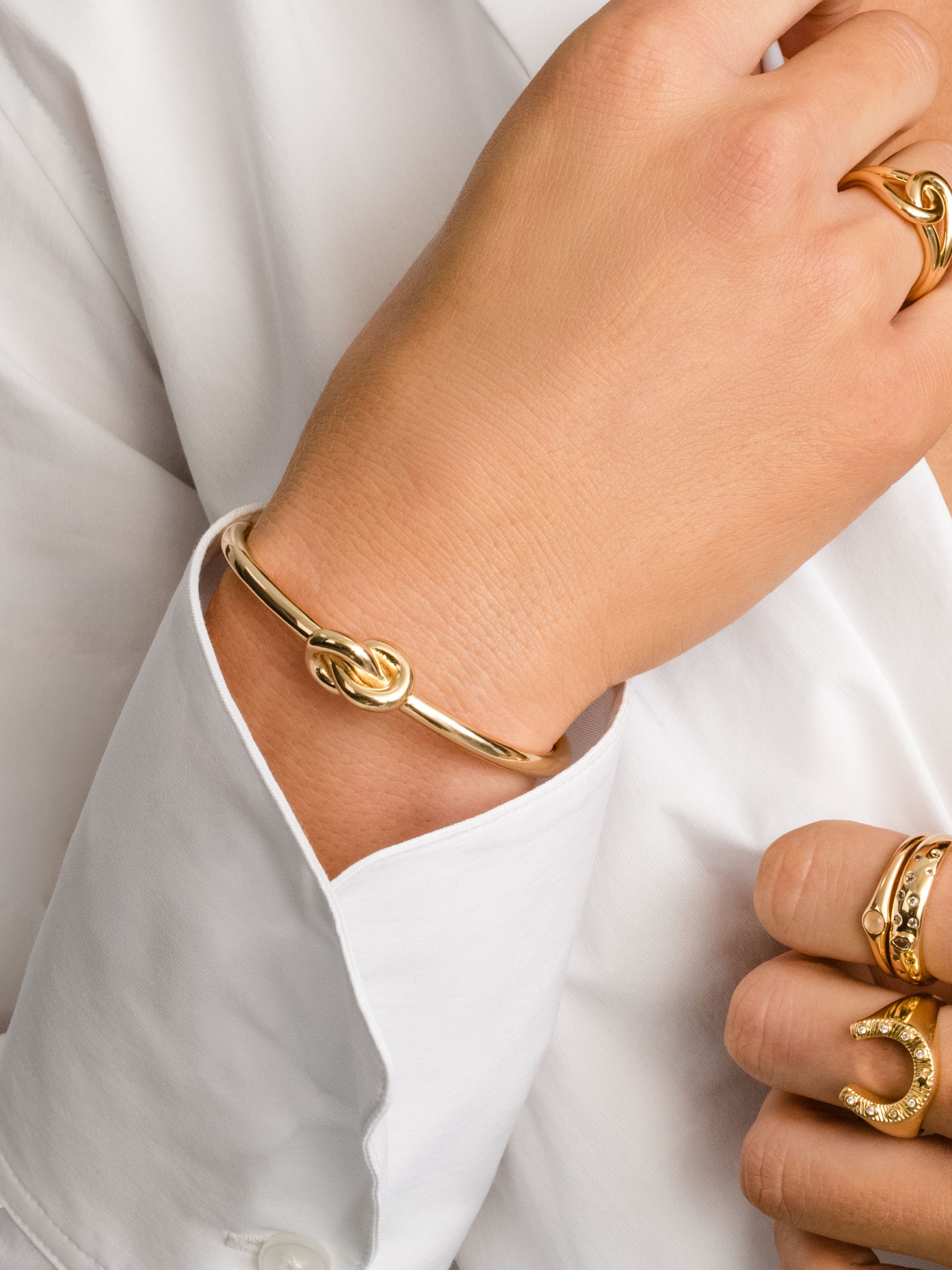 Forever Knot Cuff Bracelet | Gold | Model Image | Uncommon James
