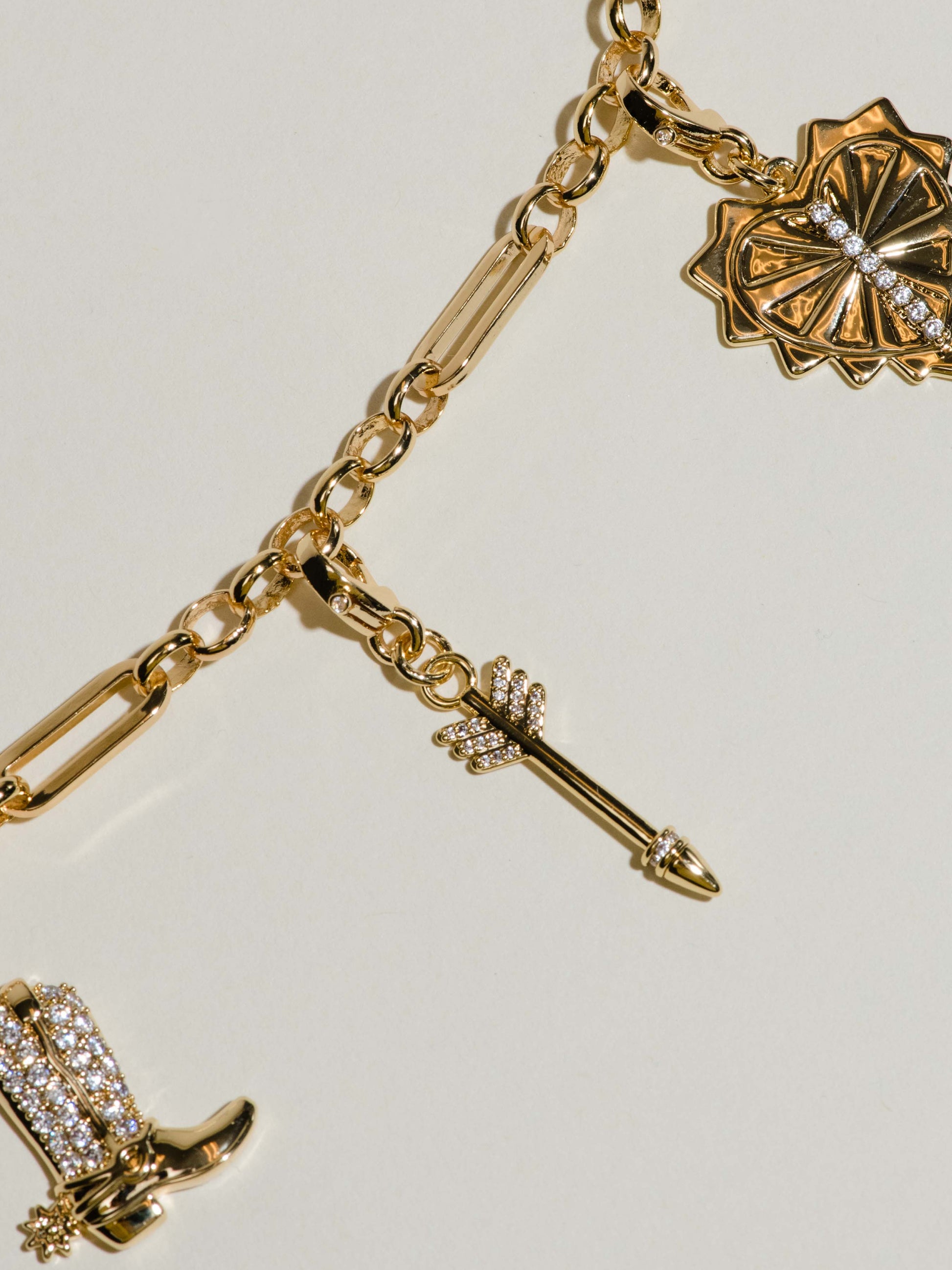 Arrow Charm | Gold | Flatlay Image | Uncommon James